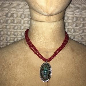 Beaded necklace with pendant